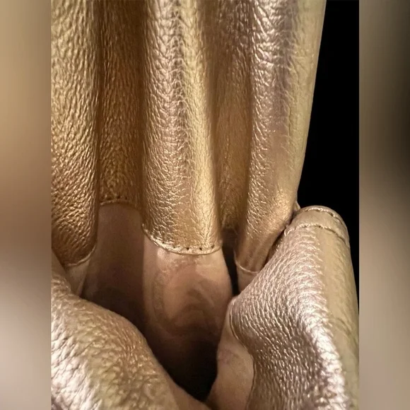 Michael Kors Metallic Gold Leather Drawstring Shoulder Bag. - Picture 6 of 16